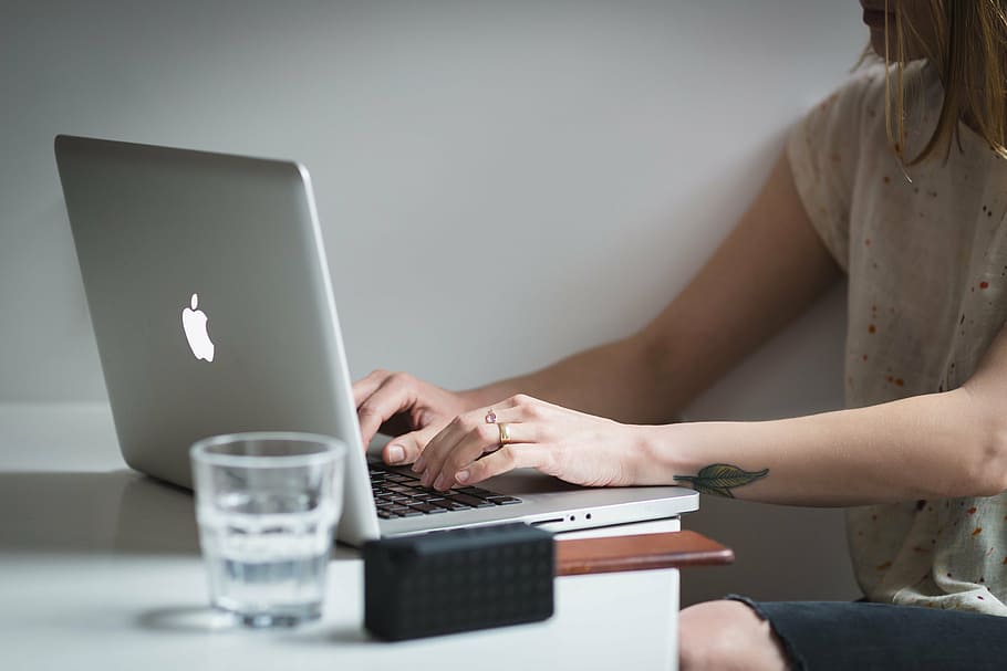 woman using MacBook Pro, laptop, apple, computer, browser, research HD wallpaper