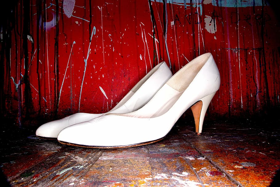 pair of women's white leather closed-toe pump on brown wooden table HD wallpaper
