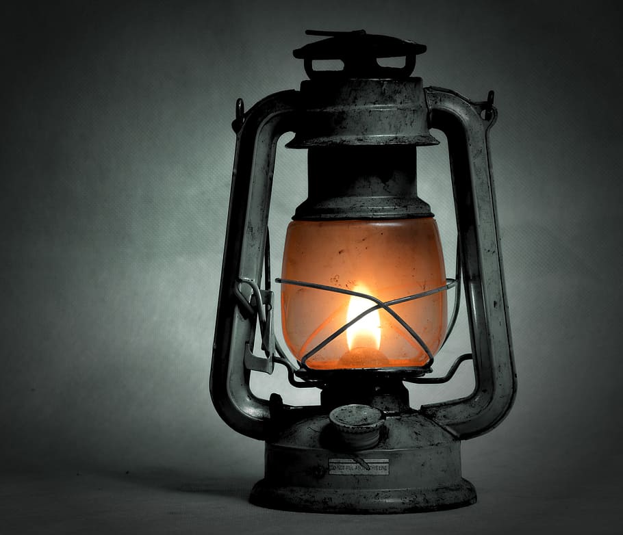 selective photography of kerosene lantern, kerosene lamp, old