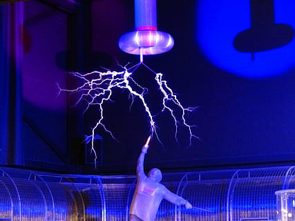 person figurine under electric post, flash, tesla coil, experiment HD wallpaper