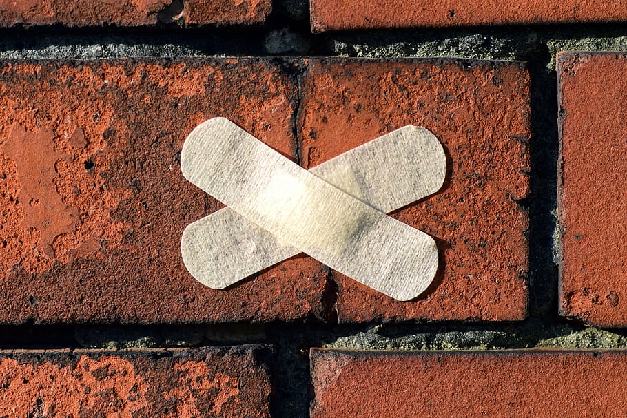 two x shaped white band aids on brown surface, patch, stone, facade, HD wallpaper