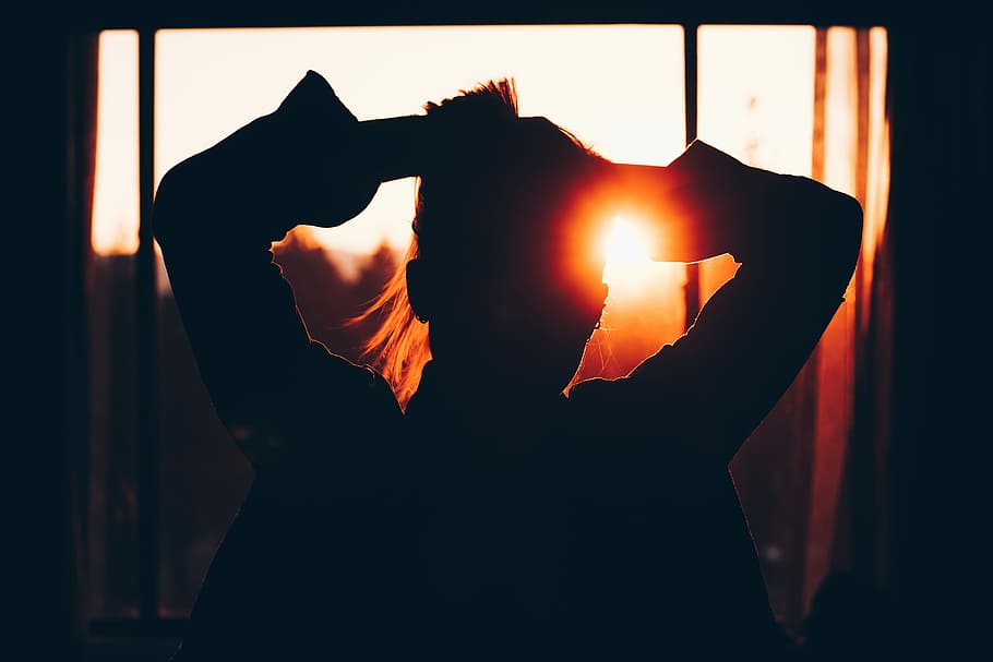 silhouette of woman holding hair, silhouette of person raising hand near window HD wallpaper