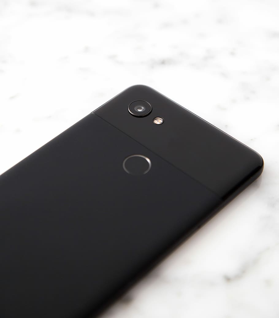black Android smartphone on gray surface, black Android smartphone on table HD wallpaper