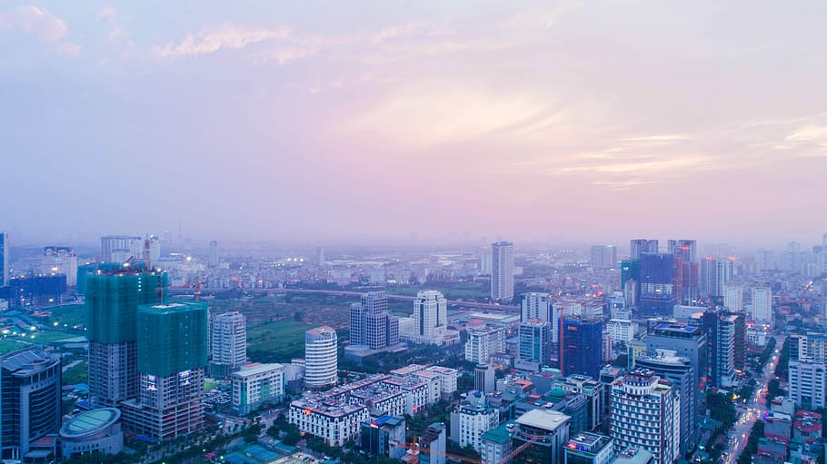 Hanoi in dusk, aerial view of high-rise buildings, roof tops