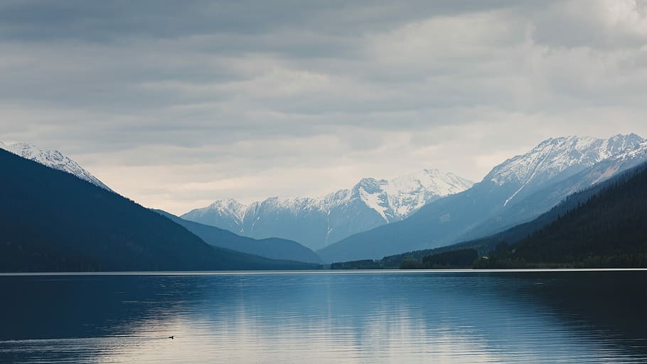 landscape photography of horizon, mountain coated with snow near lake during daytime HD wallpaper