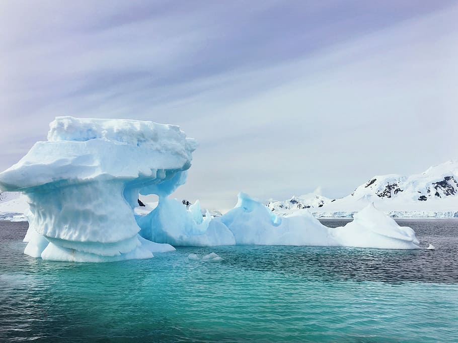 iceberg in middle of ocean, iceberg on body of water, sea, cloudscape HD wallpaper