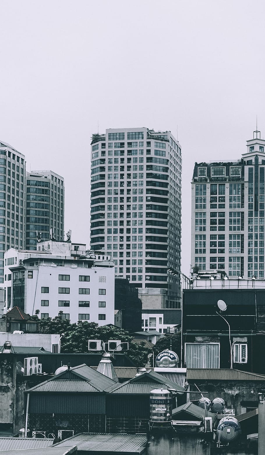 photo of white highrise building, aerial photography of high-rise building during daytime HD wallpaper