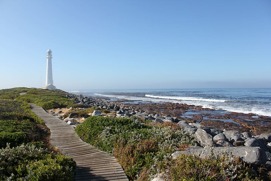 lighthouse, rocks, boulevard, sea, water, blue, sky, beacon HD wallpaper