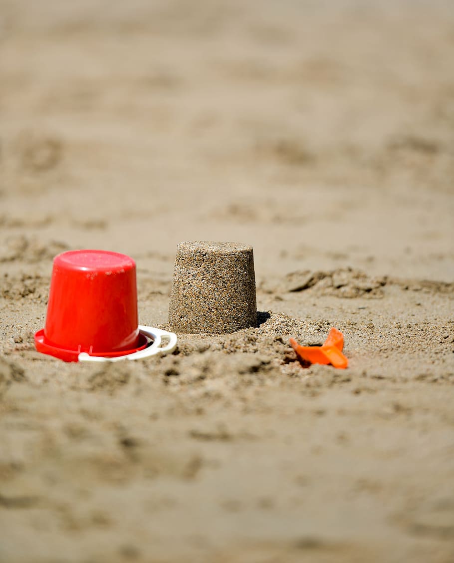 red sand bucket with shovel on seashore, beach, play, toy, sandcastle HD wallpaper