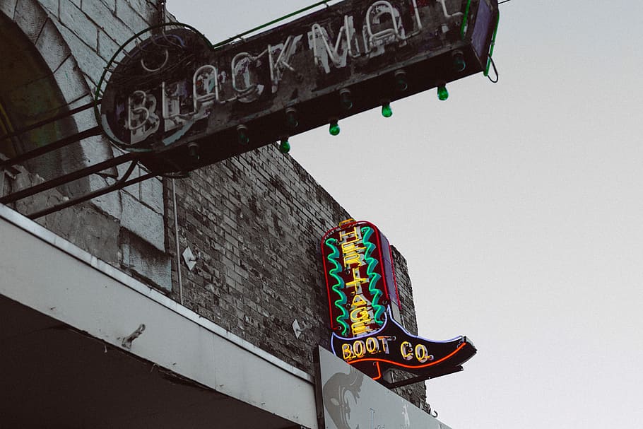 low angle photography of Black Mall signboard, neon signage on bricked building during daytime HD wallpaper