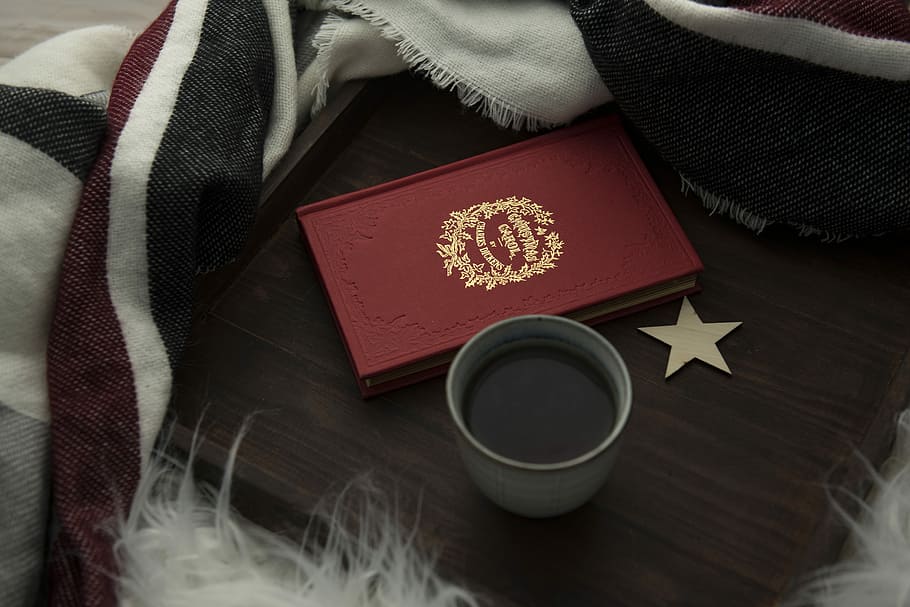 red hardbound book beside cup of coffee, red book and gray cup filled with black liquid HD wallpaper