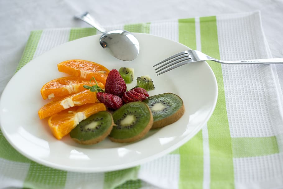 kiwi, orange, and strawberry fruits serving on plate, dish HD wallpaper