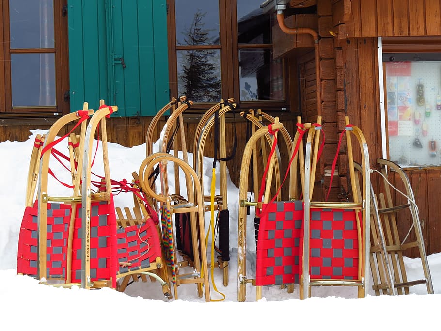 brown and red sled lot leaning on wall, slide, hut, snow, fun HD wallpaper