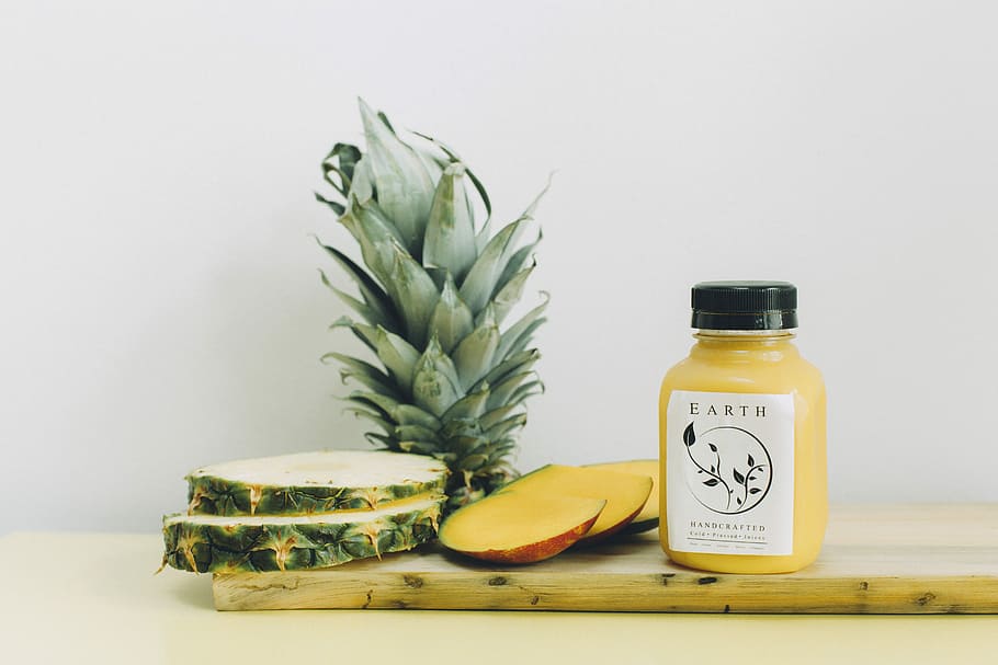 slice pinepple and earth bottle, sliced pineapples on white surface HD wallpaper