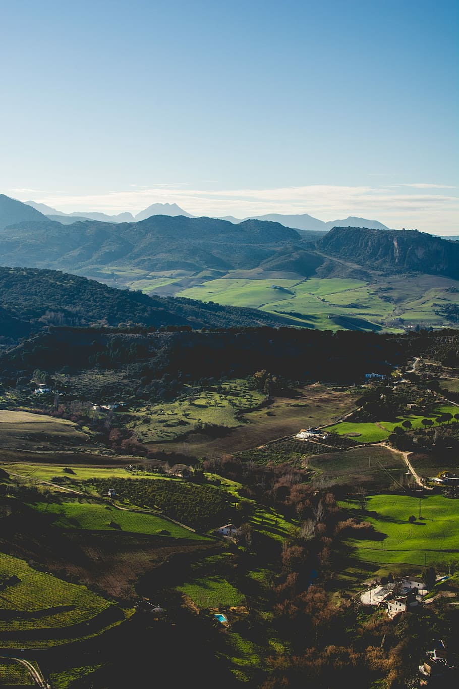 green hills and mountain, person taking photo of mountain at daytime HD wallpaper