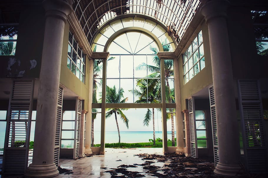 beige interior, empty building with glass window near sea at daytime HD wallpaper