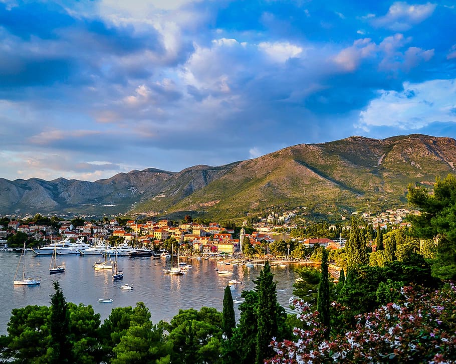 landscape photography of mountain with city buildings, village