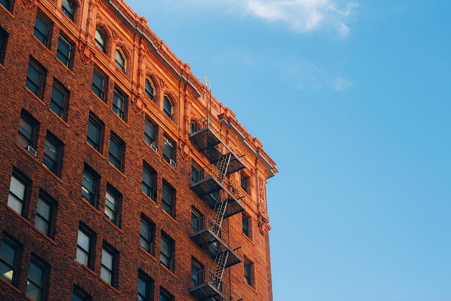 brown concrete brick building during daytime, photo of brown concrete building HD wallpaper