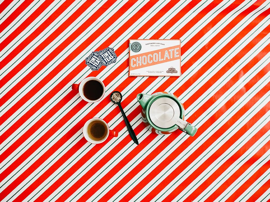 cup of coffee on red and white striped surface, flat lay photography of teapot and coffee-filled teacups HD wallpaper