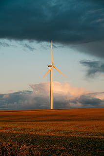 white wind turbine, white wind turbine on the brown grass field HD wallpaper