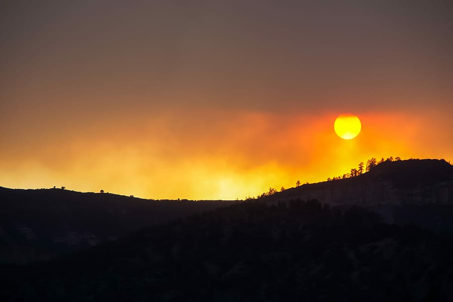 silhouette photo of mountain, silhouette photography of heel during golden hour HD wallpaper
