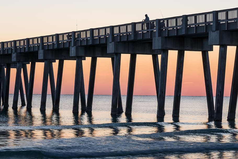 Sunset contemplation, brown dock during golden hour photography HD wallpaper