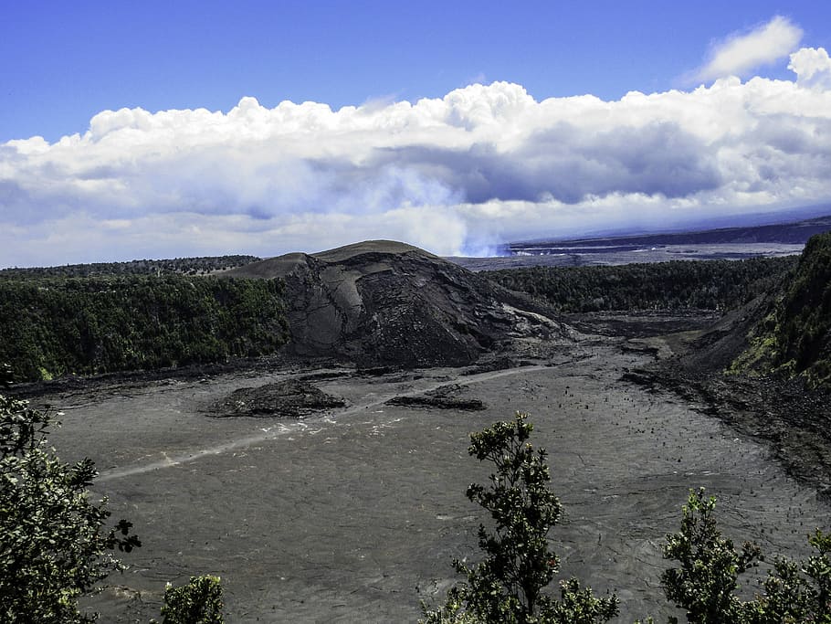 Kilauea Iki vent in Hawaii Volcanoes National Park, clouds, photos