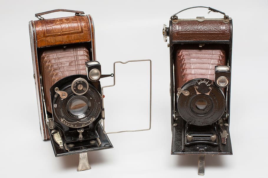 two brown folding cameras on white surface, nostalgia, vintage HD wallpaper