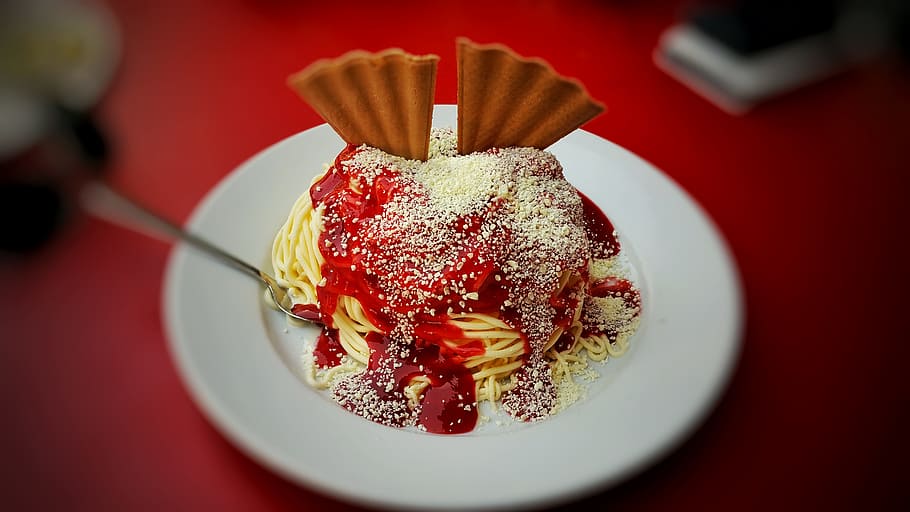 dessert on top of white plate, ice, spaghetti ice cream, vanilla ice cream