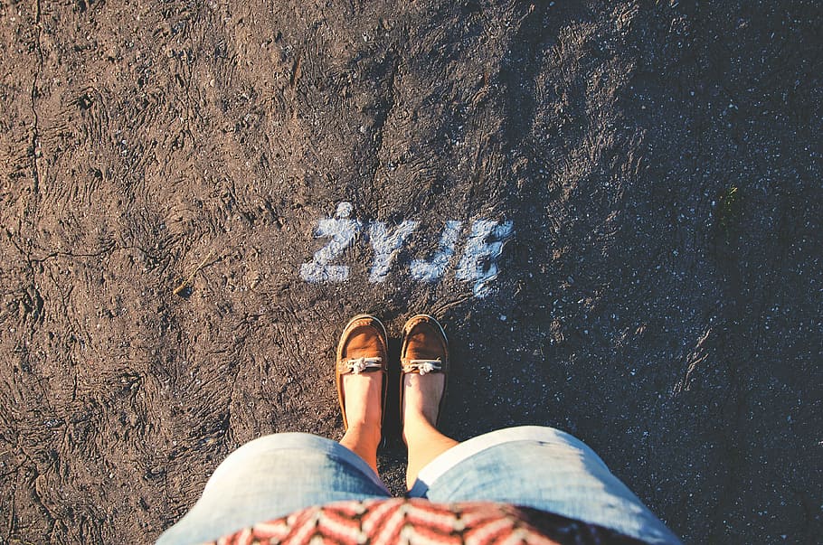 person taking a picture of brown loafers, person standing on ZYJE letters marked in surface, HD wallpaper
