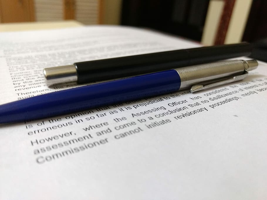 blue and black click pens on white printer paper, book, text HD wallpaper