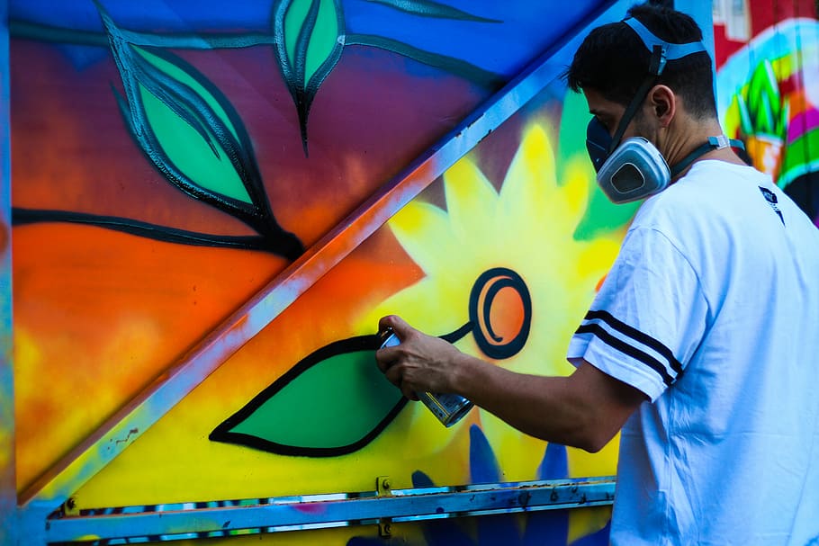 man coloring wall with yellow paint wearing mask, men, people HD wallpaper