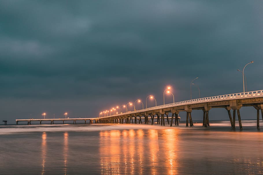 light, sea, city, dawn, architecture, bridge, cloudy, connection HD wallpaper