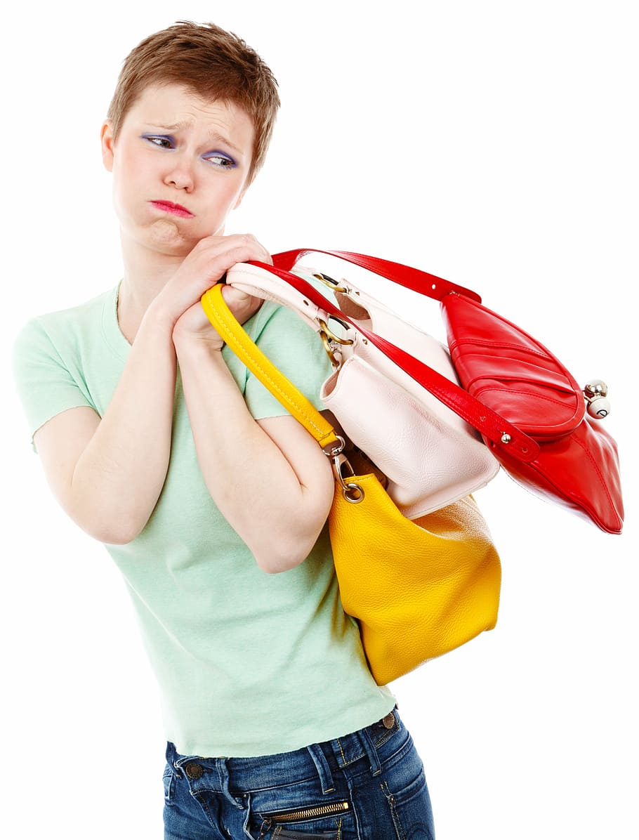 woman carrying three leather handbags, adult, buy, buyer, consumer