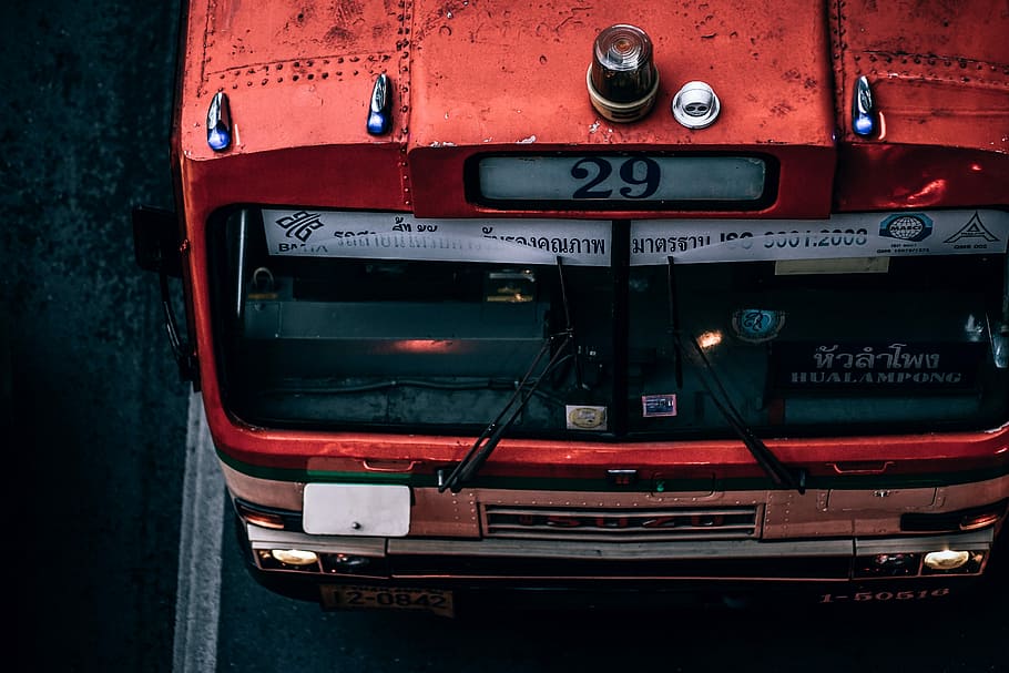 top-view of bus on asphalt road, aerial photography of red bus HD wallpaper