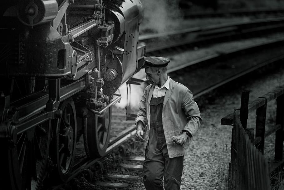 Checking the Wheels, grayscale photo of man beside train, male HD wallpaper