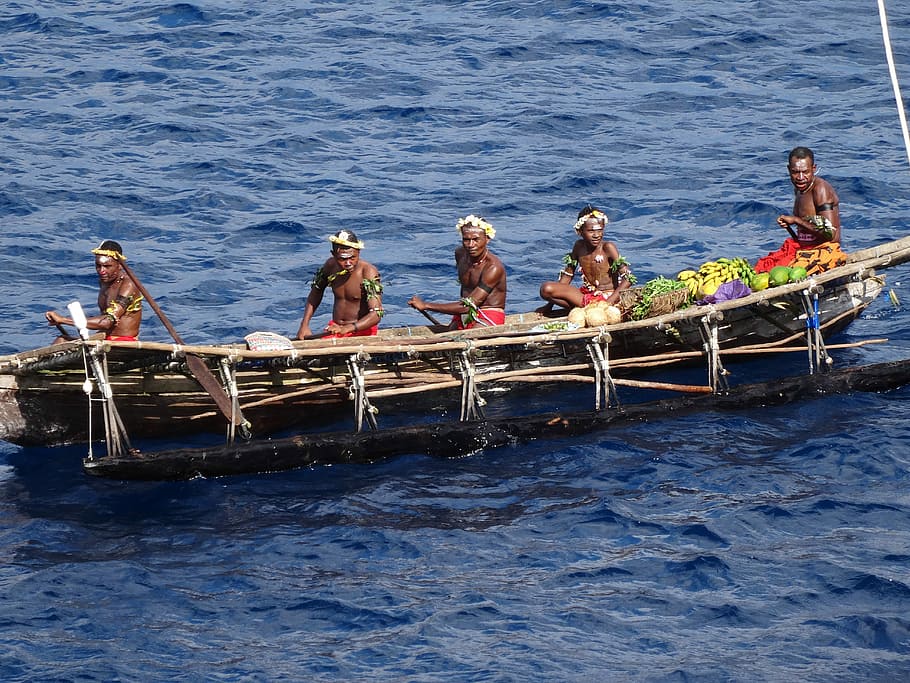 Natives in a boat in Papua New Guinea, photos, people, public domain