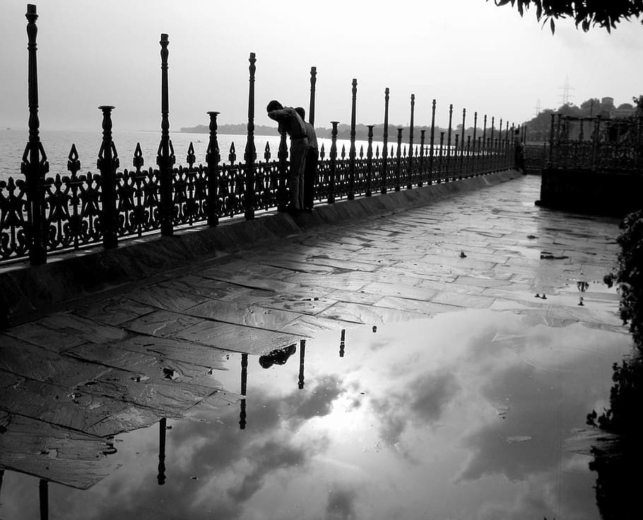 rainy, evening, sidewalk, water, puddle, man, fence, sky, cloud - sky HD wallpaper