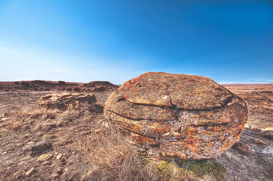 brown rock on brown soil, gray, stone, photography, boulder HD wallpaper