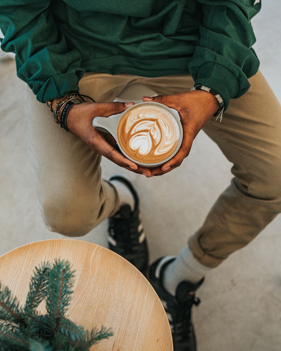 person holding cup with designed coffee, person holding cup filled with coffee HD wallpaper
