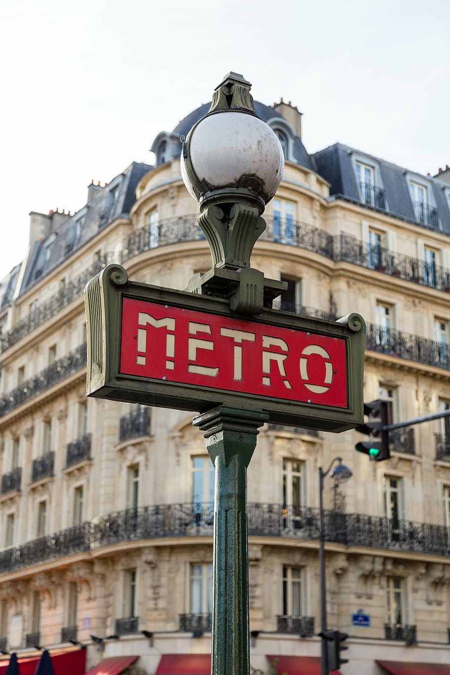 Metro road sign under white light fixture, street, lamp, architecture HD wallpaper