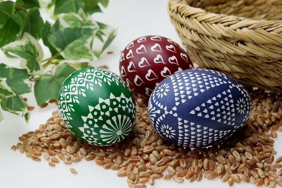 green, red, and blue egg trinkets on brown rice, sorbian easter eggs, HD wallpaper