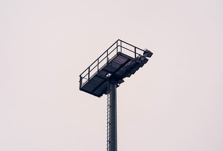 low angle photo of black metal tower at daytime, worm's eye view photography of black metal post HD wallpaper
