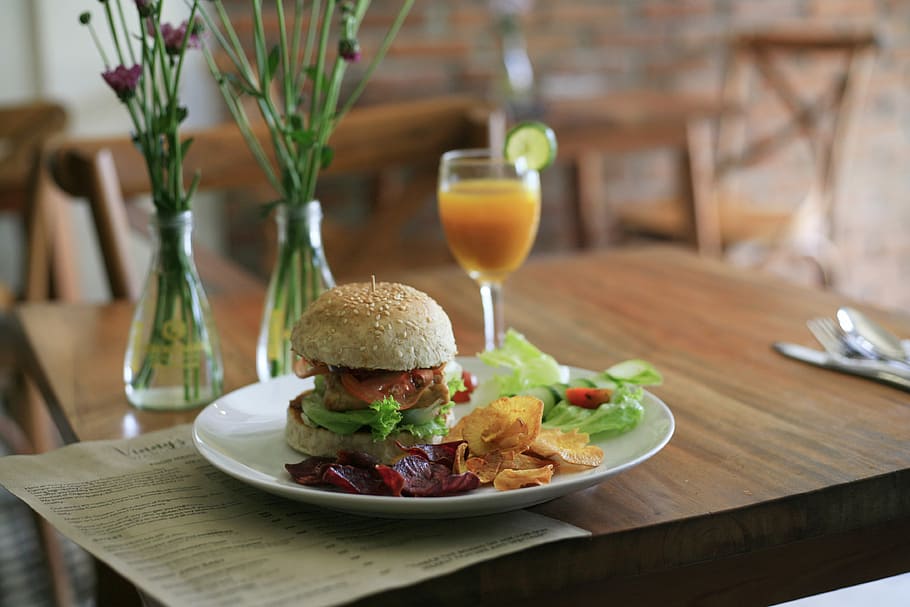 shallow focus photography of hamburger on white ceramic plate, hamburger on plate HD wallpaper