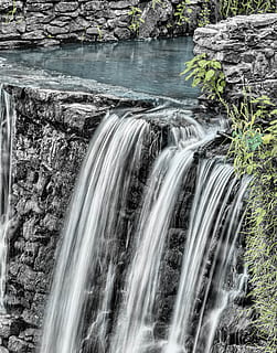time lapse photography of water falling down on creek during daytime HD wallpaper