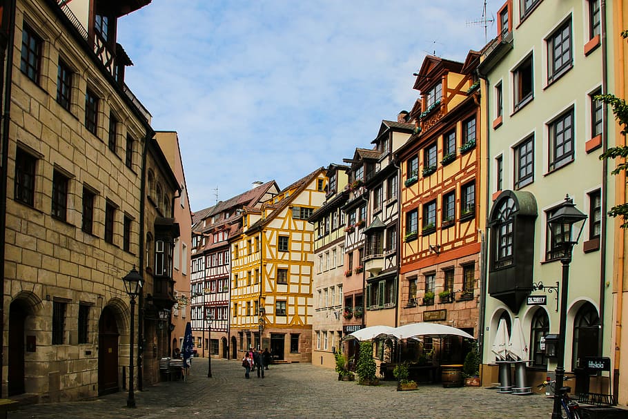 person walking between buildings, nuremberg, old town, middle ages, HD wallpaper