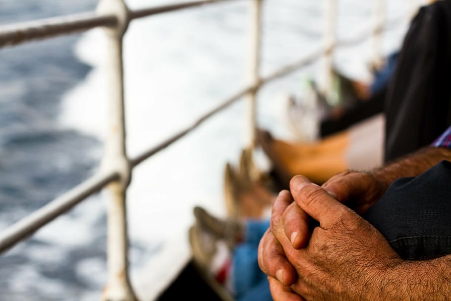 selective focus photography of person holding his knee, people HD wallpaper