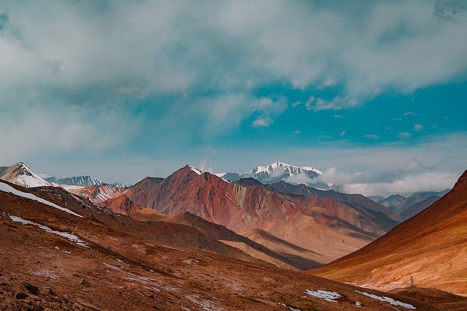 mountains under blue sky and white clouds at daytime, landscape HD wallpaper