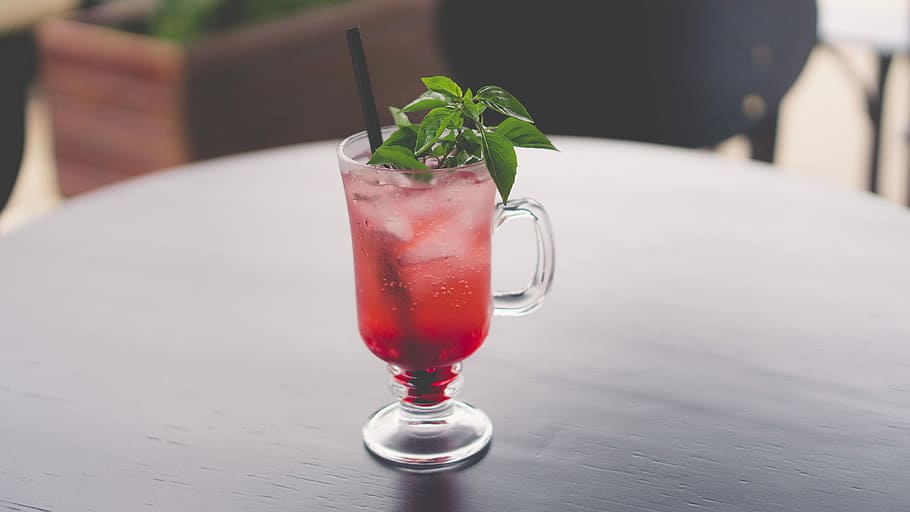 clear mug with straw and leafed plant, filled clear footed glass HD wallpaper