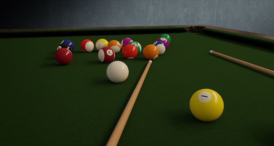 billiard balls and cue sticks on green pool table, billiards